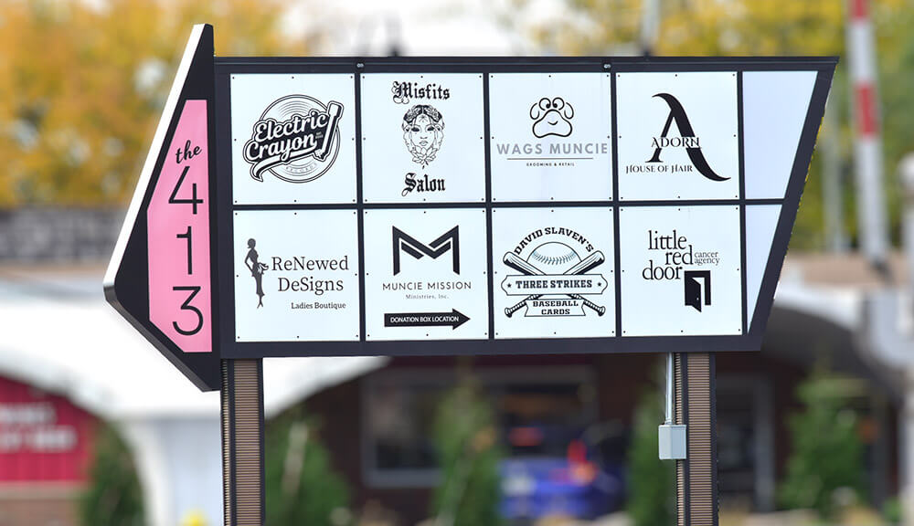 The outdoor sign and tenants that make up the 413. Photo by Mike Rhodes